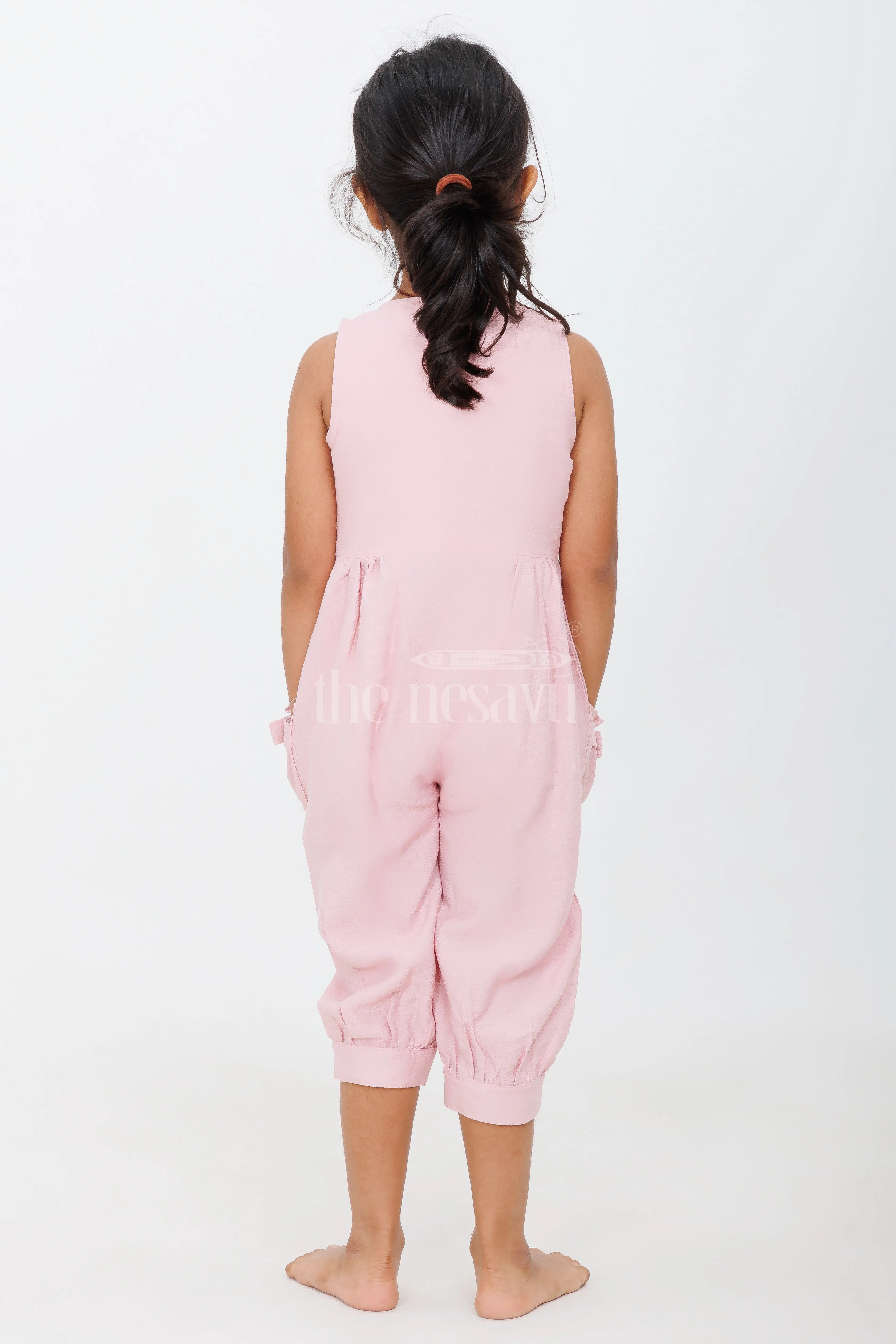 Adorable Pink Girls Jumpsuit with Oversized Bow Pockets and Button-Down Front