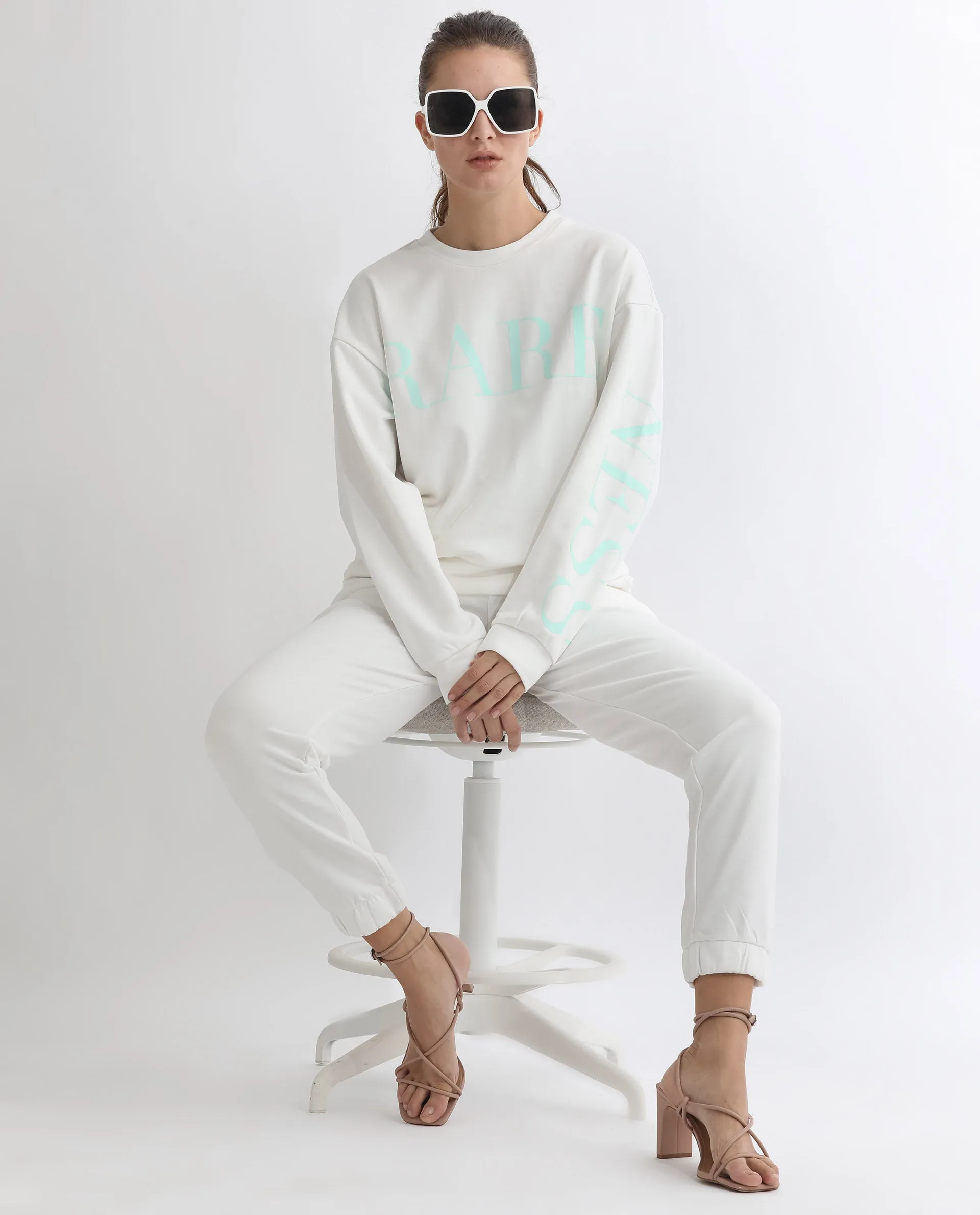 Rareism Articale Women Shelly Off White Poly Cotton Fabric Full Sleeves Cuffed Sleeve Round Neck Relaxed Fit Graphic Print Sweatshirt